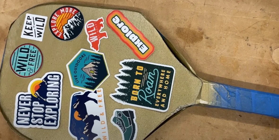 add decorative stickers to the paddle surface