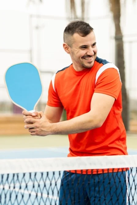 Sid is playing a pickleball game