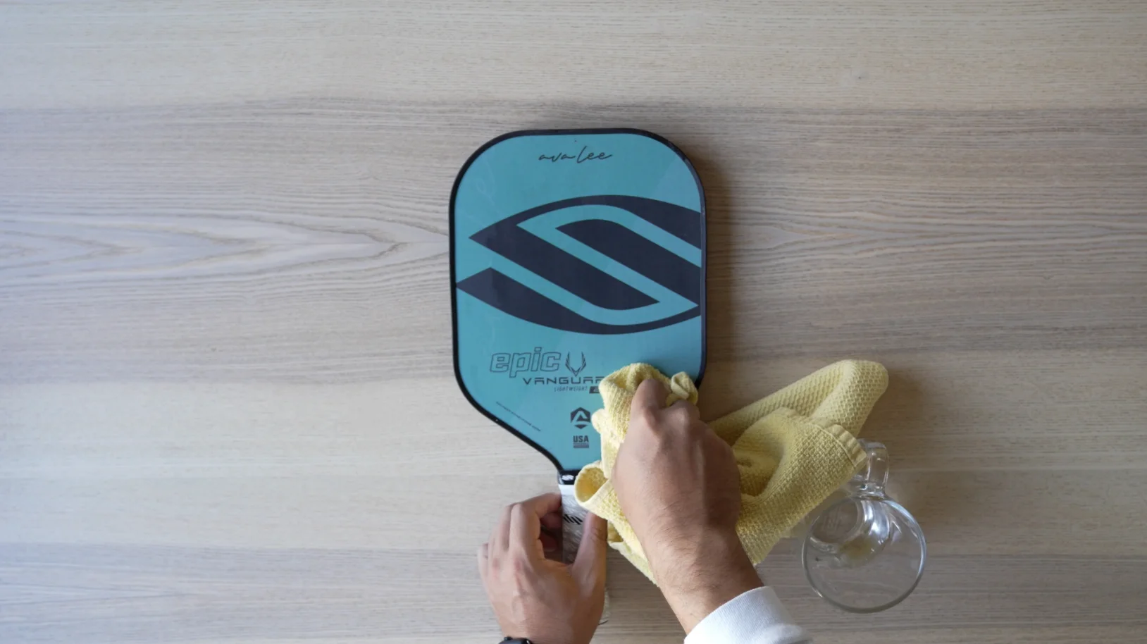 use warm water to clean pickleball paddle